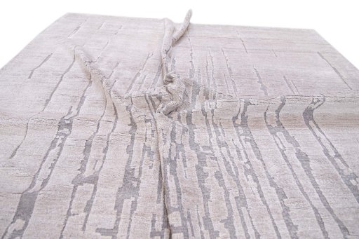 Backside of handmade New Mahli rug showing knot structure and weave density