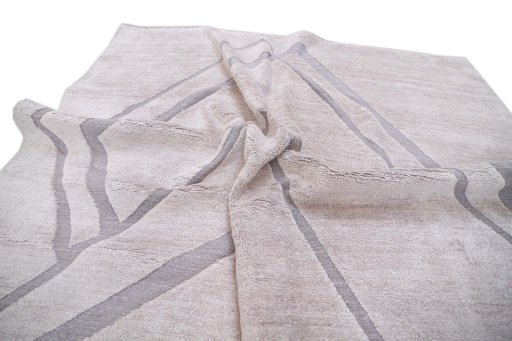 Backside of handmade New Mahli rug showing knot structure and weave density