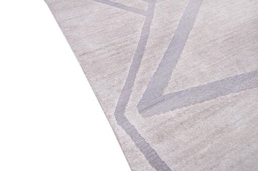 Backside of handmade New Mahli rug showing knot structure and weave density