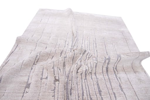 Backside of handmade New Mahli rug showing knot structure and weave density