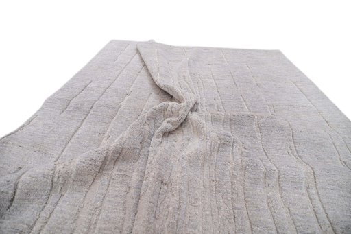 Backside of handmade New Mahli rug showing knot structure and weave density