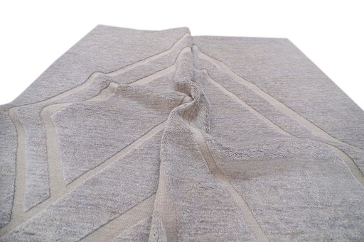 Backside of handmade New Mahli rug showing knot structure and weave density