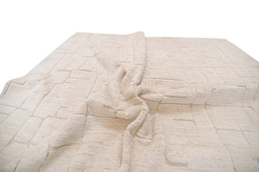 Backside of handmade New Mahli rug showing knot structure and weave density