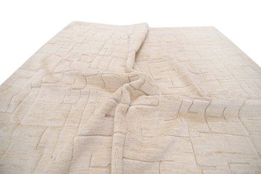 Backside of handmade New Mahli rug showing knot structure and weave density
