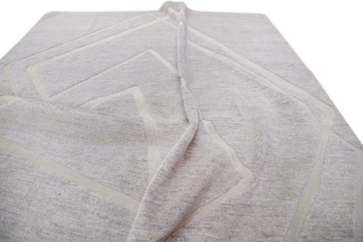 Backside of handmade New Mahli rug showing knot structure and weave density