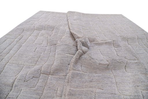 Backside of handmade New Mahli rug showing knot structure and weave density