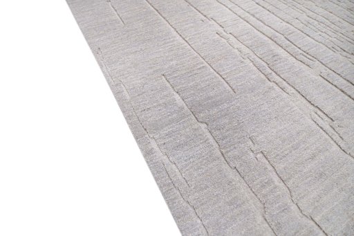 Backside of handmade New Mahli rug showing knot structure and weave density