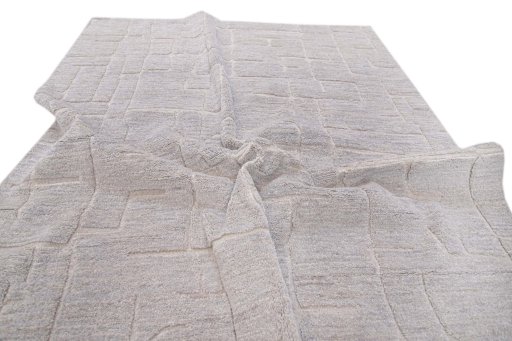 Backside of handmade New Mahli rug showing knot structure and weave density