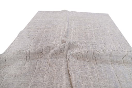 Backside of handmade New Mahli rug showing knot structure and weave density