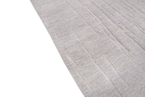 Backside of handmade New Mahli rug showing knot structure and weave density