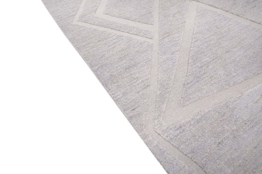 Backside of handmade New Mahli rug showing knot structure and weave density