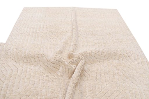 Backside of handmade New Mahli rug showing knot structure and weave density