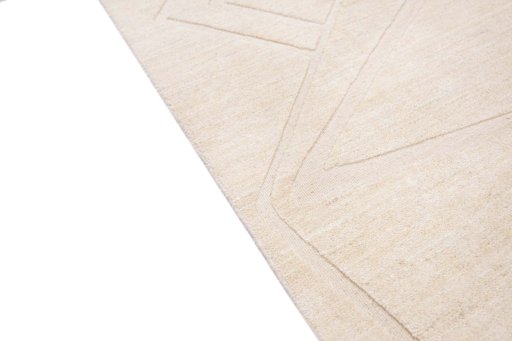 Backside of handmade New Mahli rug showing knot structure and weave density