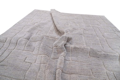 Backside of handmade New Mahli rug showing knot structure and weave density