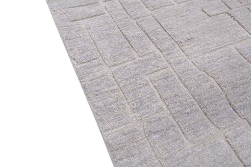 Backside of handmade New Mahli rug showing knot structure and weave density
