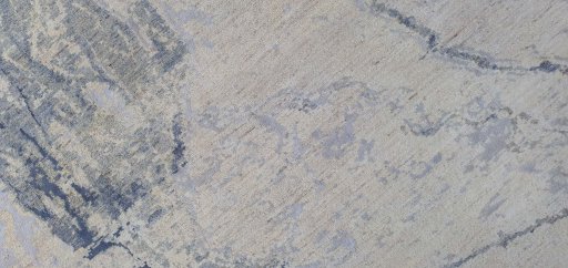 Backside of handmade New Mahli rug showing knot structure and weave density