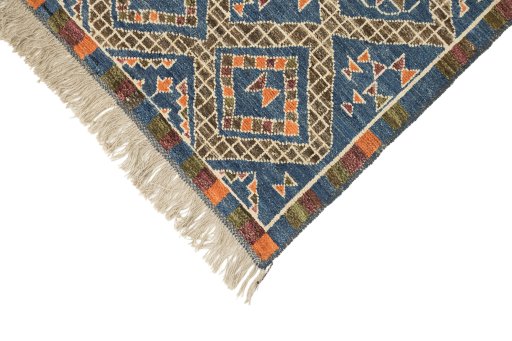 Backside of handmade New Morocco rug showing knot structure and weave density