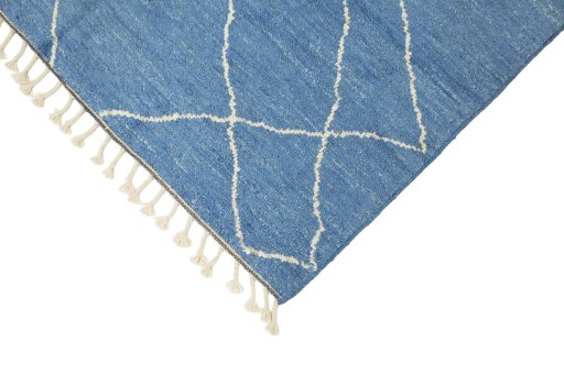 Backside of handmade New Morocco rug showing knot structure and weave density