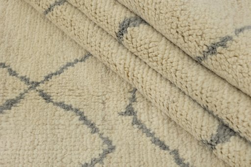 Full view of New Morocco rug from Pakistan, 301 × 208 cm in Cream tones