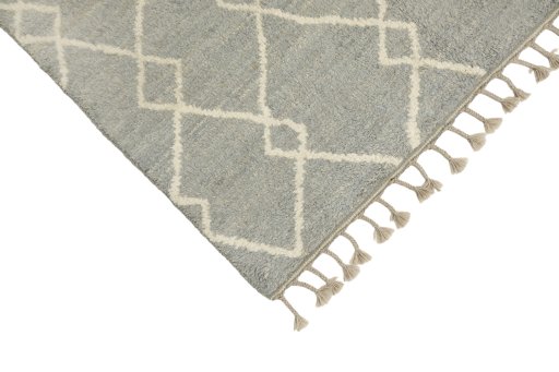Backside of handmade New Morocco rug showing knot structure and weave density