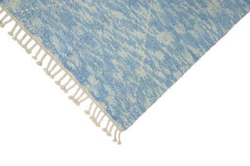Backside of handmade New Morocco rug showing knot structure and weave density