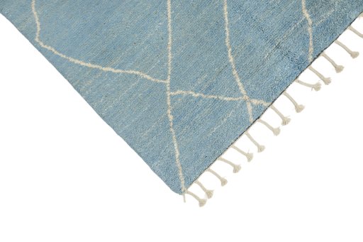 Backside of handmade New Morocco rug showing knot structure and weave density
