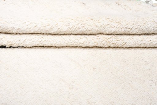 Corner detail of New Morocco rug showing border pattern and Wool pile