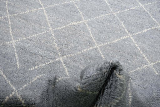 Corner detail of New Morocco rug showing border pattern and Wool pile