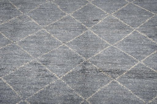 Backside of handmade New Morocco rug showing knot structure and weave density