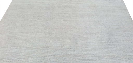 Backside of handmade New Morocco rug showing knot structure and weave density