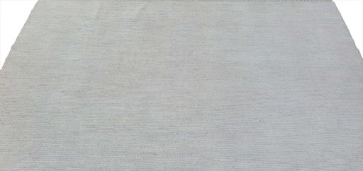 Backside of handmade New Morocco rug showing knot structure and weave density