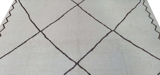 Backside of handmade New Morocco rug showing knot structure and weave density