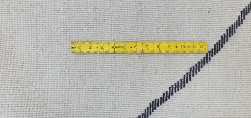 Full view of New Morocco rug from Pakistan, 342 × 247 cm in Beige tones