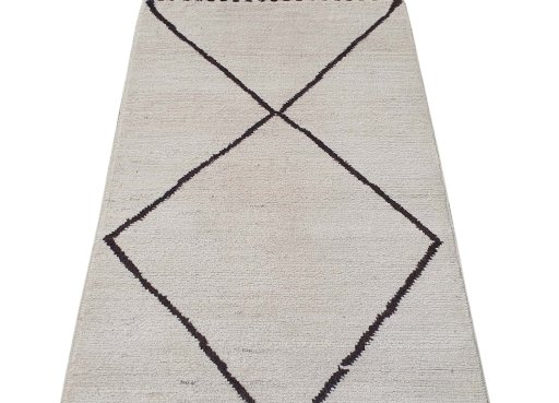 Backside of handmade New Morocco rug showing knot structure and weave density