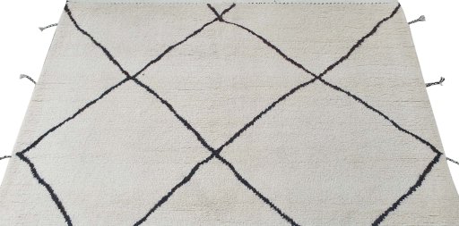 Backside of handmade New Morocco rug showing knot structure and weave density