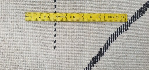 Full view of New Morocco rug from Pakistan, 227 × 165 cm in Beige tones
