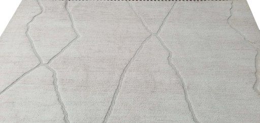 Backside of handmade New Morocco rug showing knot structure and weave density