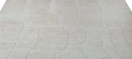 Backside of handmade New Morocco rug showing knot structure and weave density