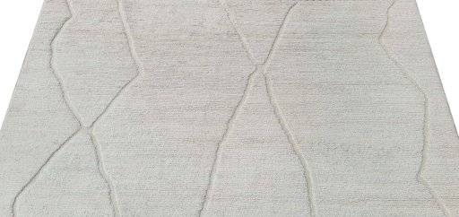 Backside of handmade New Morocco rug showing knot structure and weave density