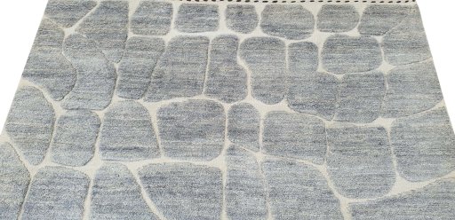 Backside of handmade New Morocco rug showing knot structure and weave density