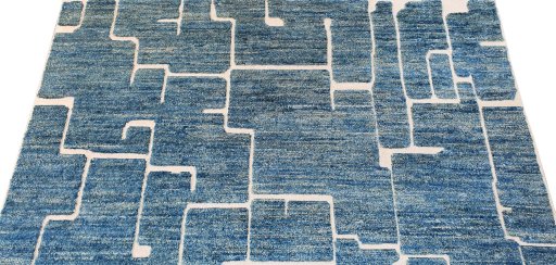 Backside of handmade New Morocco rug showing knot structure and weave density