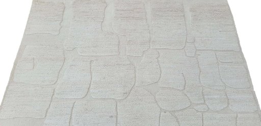 Backside of handmade New Morocco rug showing knot structure and weave density