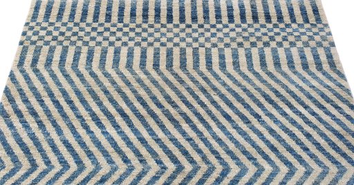 Backside of handmade New Morocco rug showing knot structure and weave density