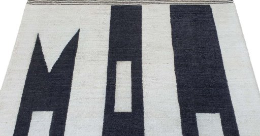 Backside of handmade New Morocco rug showing knot structure and weave density