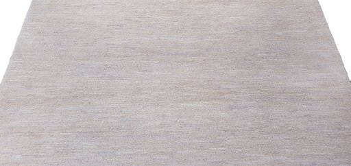 Backside of handmade New Morocco rug showing knot structure and weave density