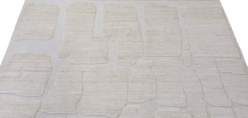 Backside of handmade New Morocco rug showing knot structure and weave density