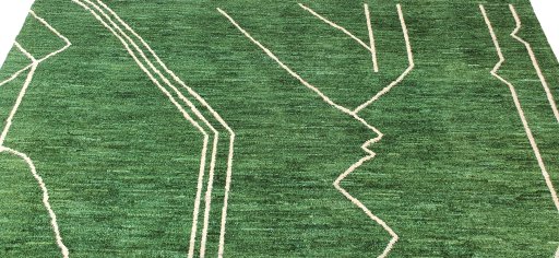 Backside of handmade New Morocco rug showing knot structure and weave density