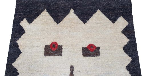 Backside of handmade New Morocco rug showing knot structure and weave density