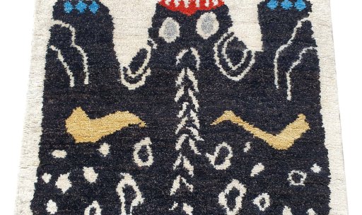 Backside of handmade New Morocco rug showing knot structure and weave density
