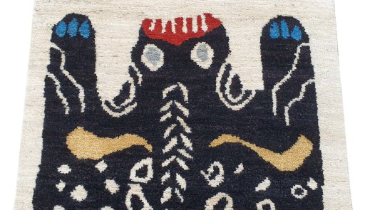 Backside of handmade New Morocco rug showing knot structure and weave density